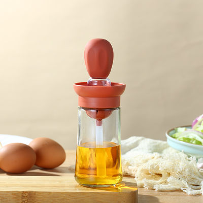 Bottiglia di distribuzione di olio di cucina sostenibile con scala e spazzola da griglia in silicone per la casa