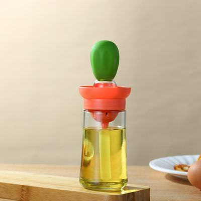 Bottiglia di distribuzione di olio di cucina sostenibile con scala e spazzola da griglia in silicone per la casa