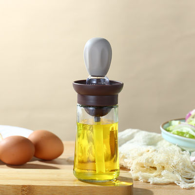 Bottiglia di distribuzione di olio di cucina sostenibile con scala e spazzola da griglia in silicone per la casa