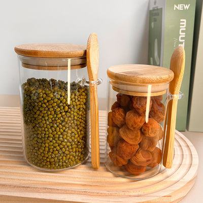 Contenitore per la conservazione degli alimenti a scaffale in vetro trasparente con design funzionale e coperchio rotondo in bambù