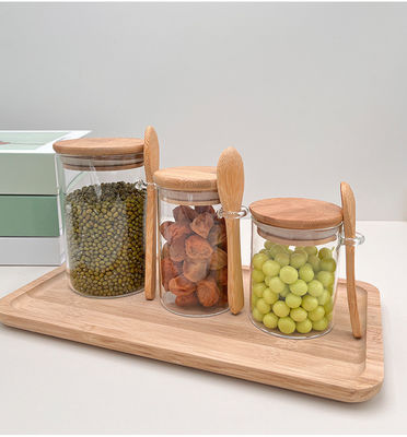 Contenitore per la conservazione degli alimenti a scaffale in vetro trasparente con design funzionale e coperchio rotondo in bambù