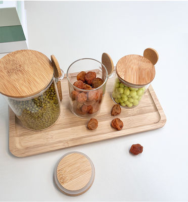 Contenitore per la conservazione degli alimenti a scaffale in vetro trasparente con design funzionale e coperchio rotondo in bambù