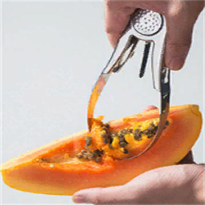 Strumento da cucina in acciaio inossidabile per scavare i frutti in modo sostenibile e rimuovere i semi di mango