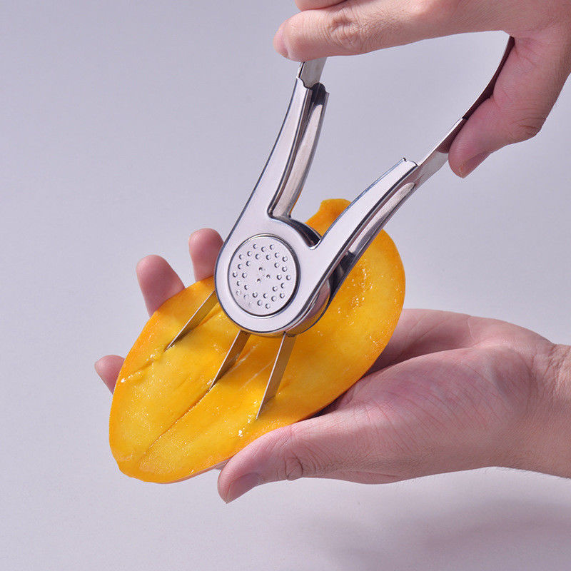 Strumento da cucina in acciaio inossidabile per scavare i frutti in modo sostenibile e rimuovere i semi di mango